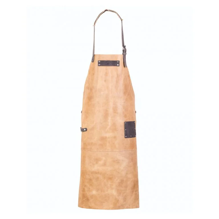 Full front view of handcrafted tan leather apron with dark straps and riveted details for chefs, bartenders, and workshop use